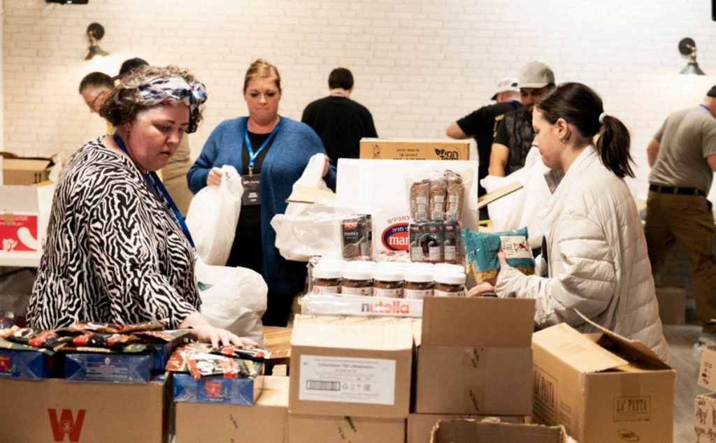 Volunteers unpacking food in Israel